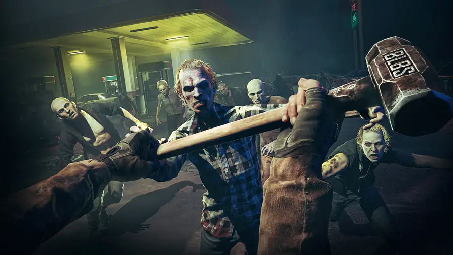 A player swings a sledgehammer at zombies outside a gas station at night